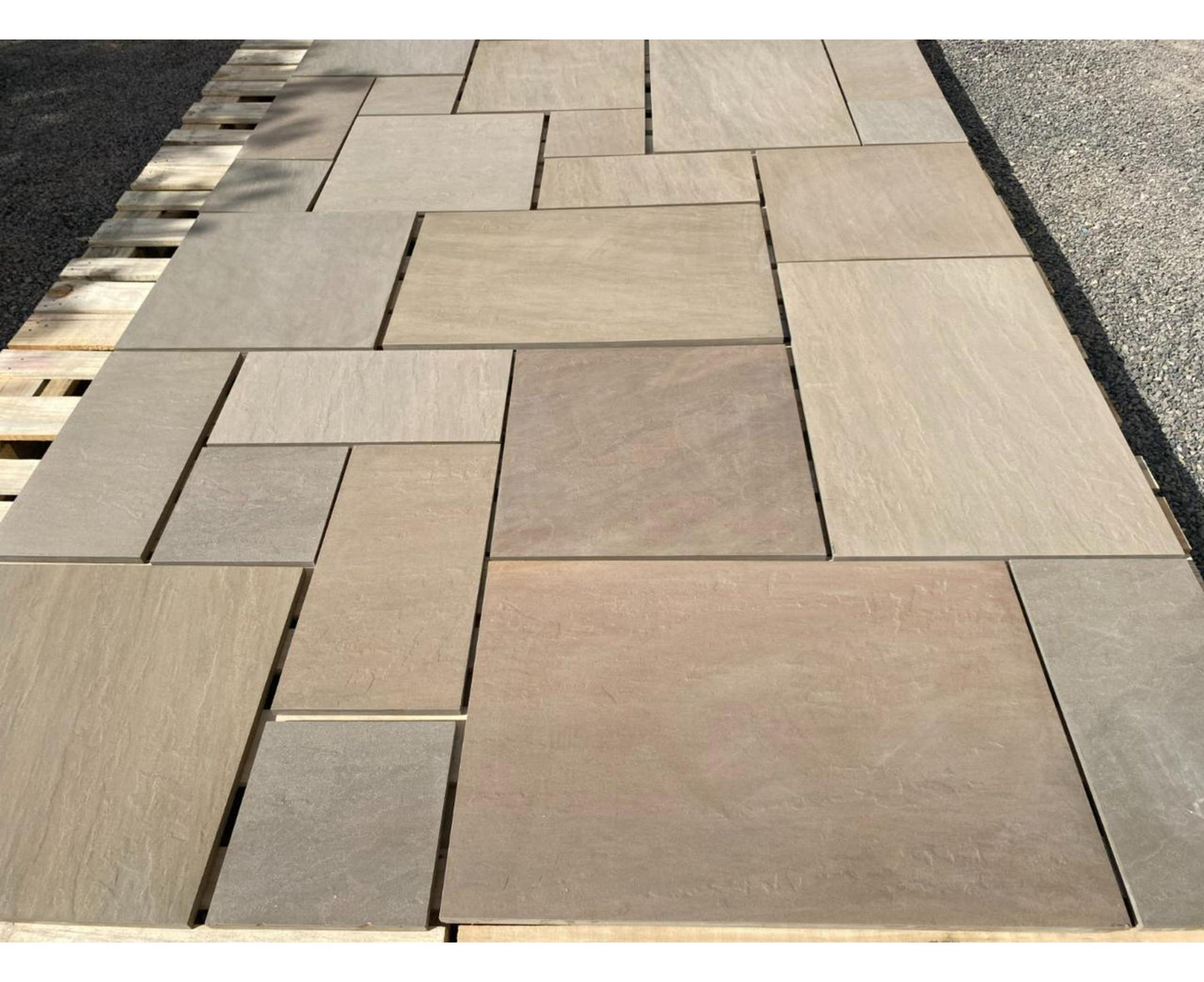 Porcelain paving in Bristol Green, contemporary patio slabs with natural stone effect.