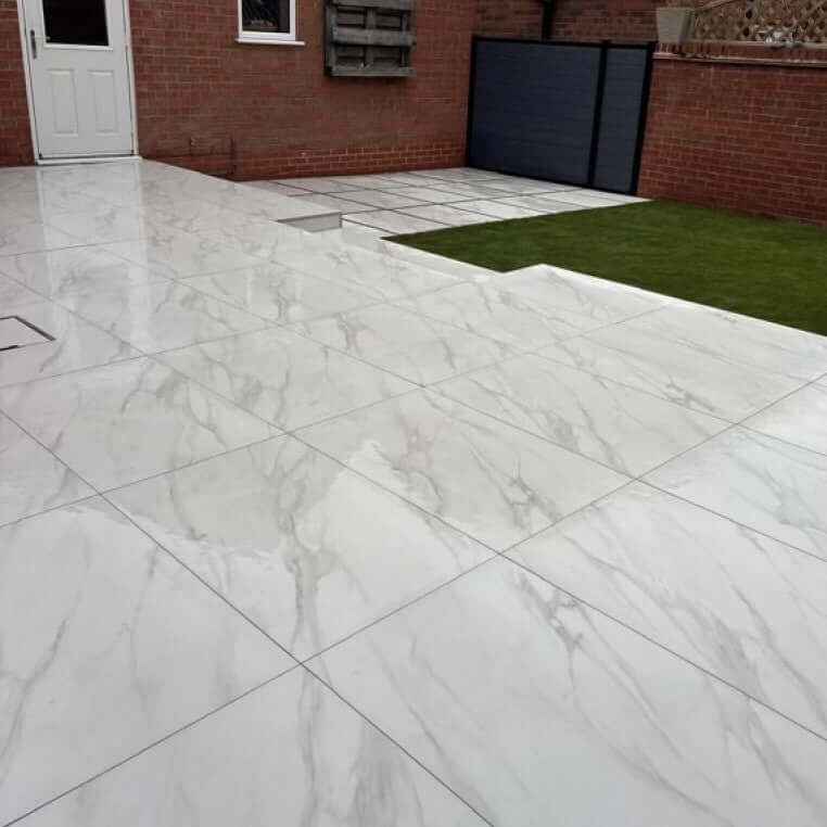 Residential patio design featuring Glasgow Marble porcelain slabs in the UK