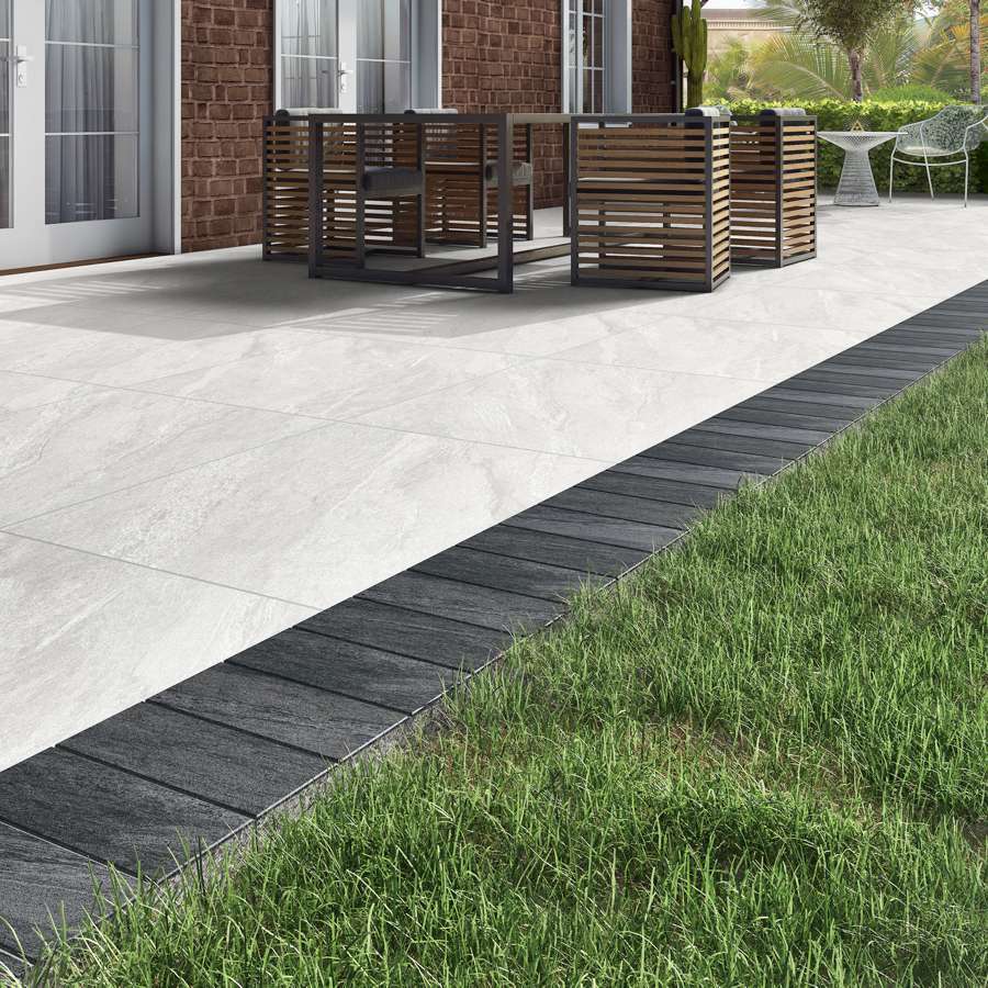 Porcelain cobbles in Midnight Grey, durable border stones for modern outdoor design.