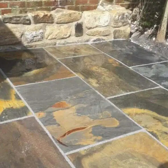 Rustic natural slate paving slabs 900x600 mm sawn edge installed in Leeds UK