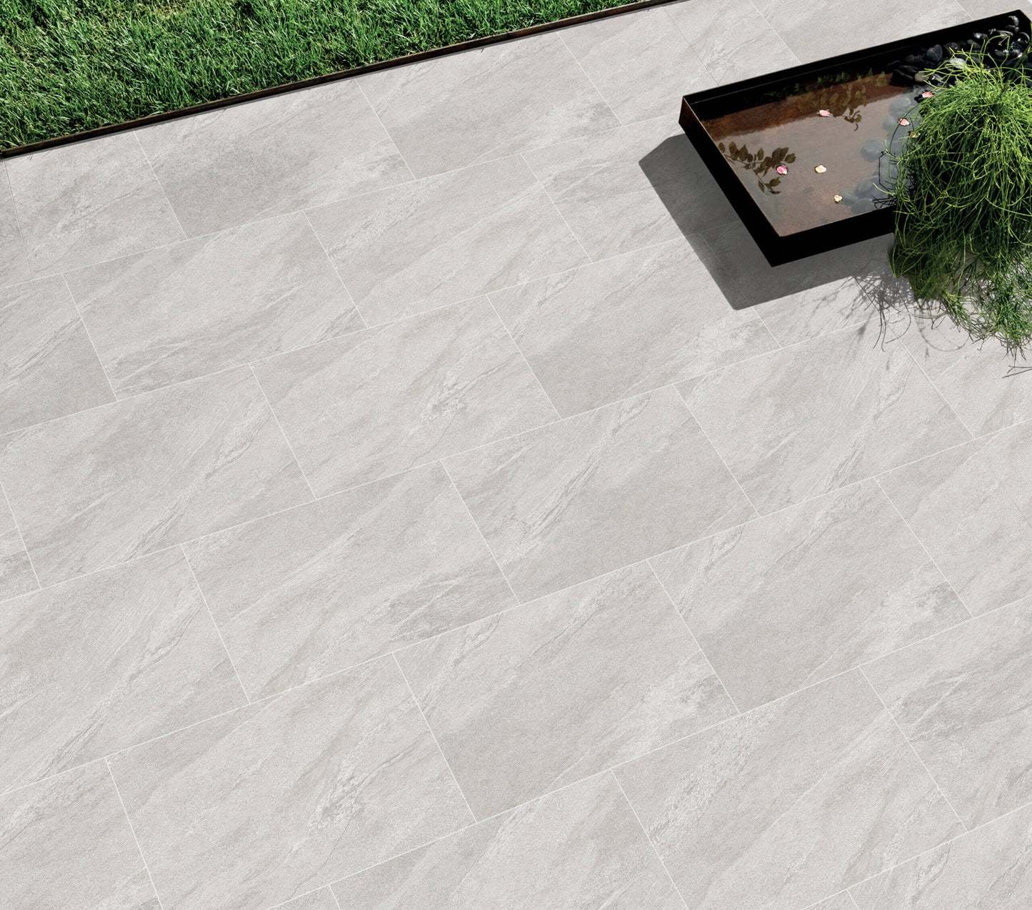Shadow Grey porcelain paving slabs, sleek dark grey finish for contemporary patios.