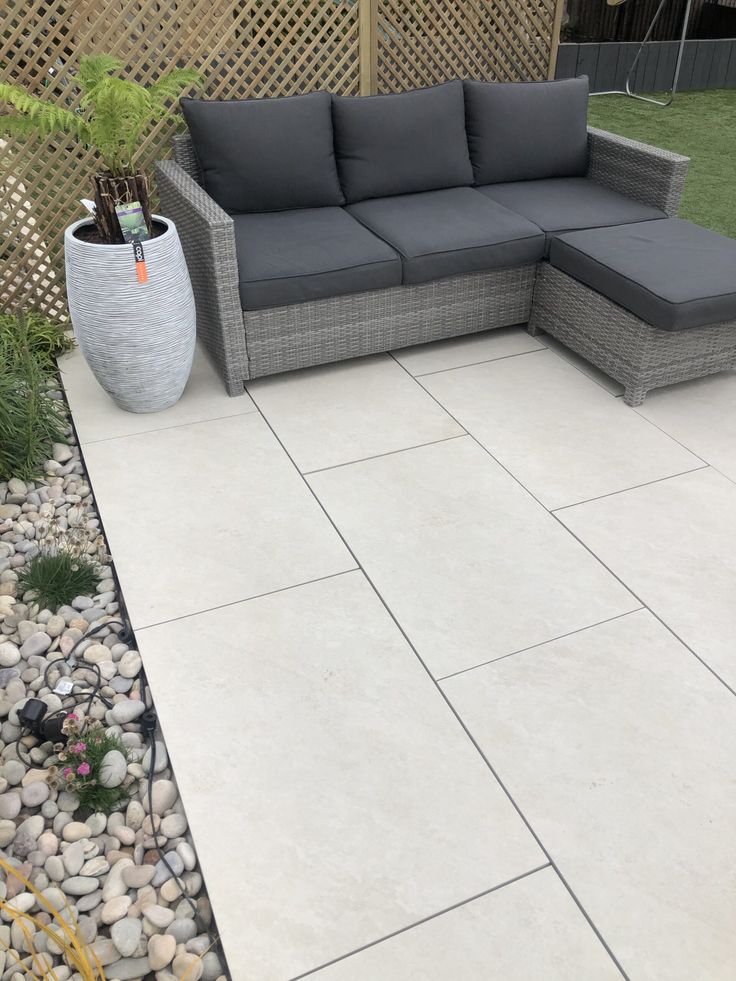 Windsor Quartz porcelain paving slabs, textured silver grey finish for luxury patios.