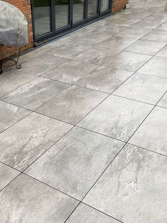 Repairing loose or wobbling individual patio slabs