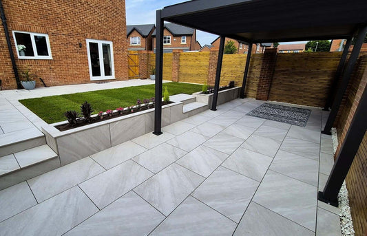UK home garden finished with Dome Grey porcelain paving slabs