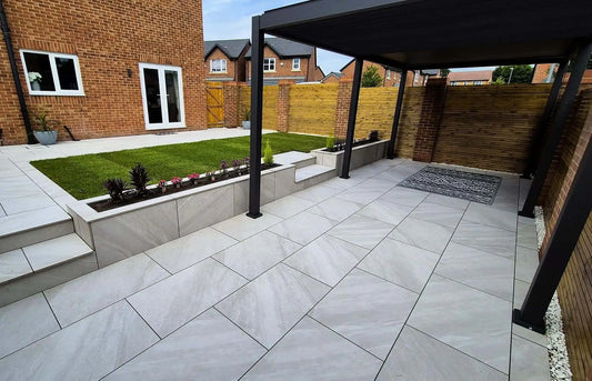 Dome Grey porcelain paving slabs installed in a modern UK home garden patio
