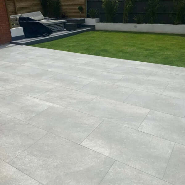 hs grey porcelain paving slabs layed in a beautiful garden in the uk