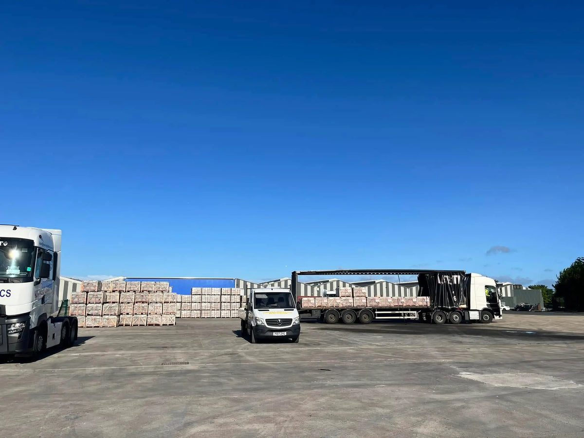 Loading porcelain slabs and paving slabs UK onto distribution trucks