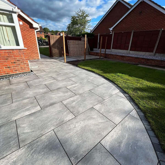Contemporary UK patio design with London Grey Porcelain Slabs