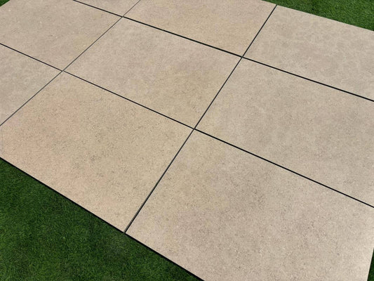 Close-up look of Sinai Pearl Porcelain Paving Slabs laid in the UK garden