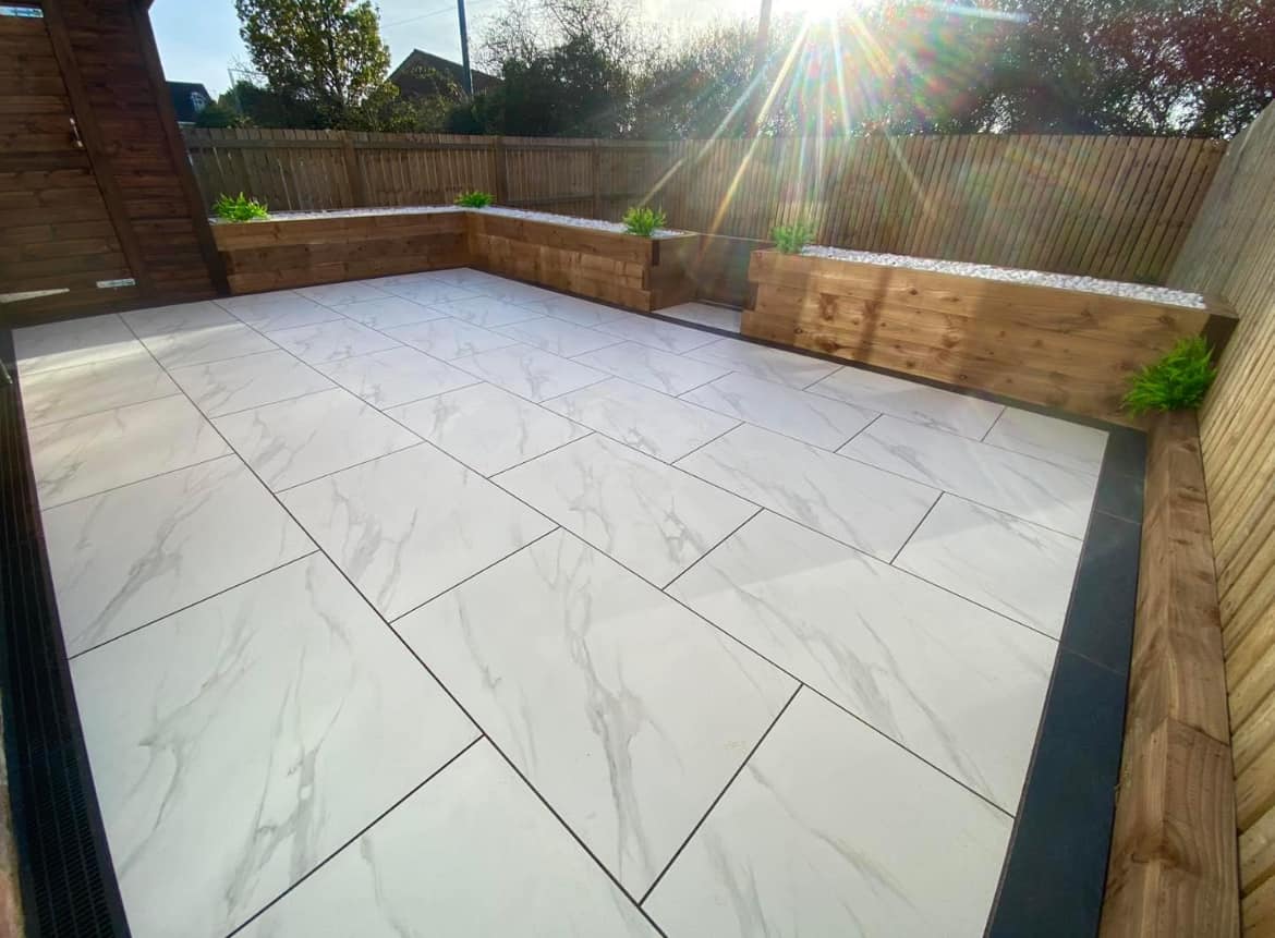 Laying Image of Stutuario Marble Porcelain Paving Slabs in the Patio