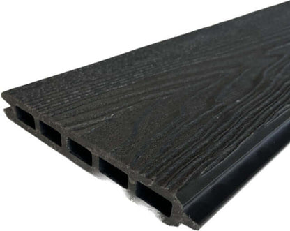 Complete black Composite Fencing kit with panels, posts, and caps for outdoor privacy fencing