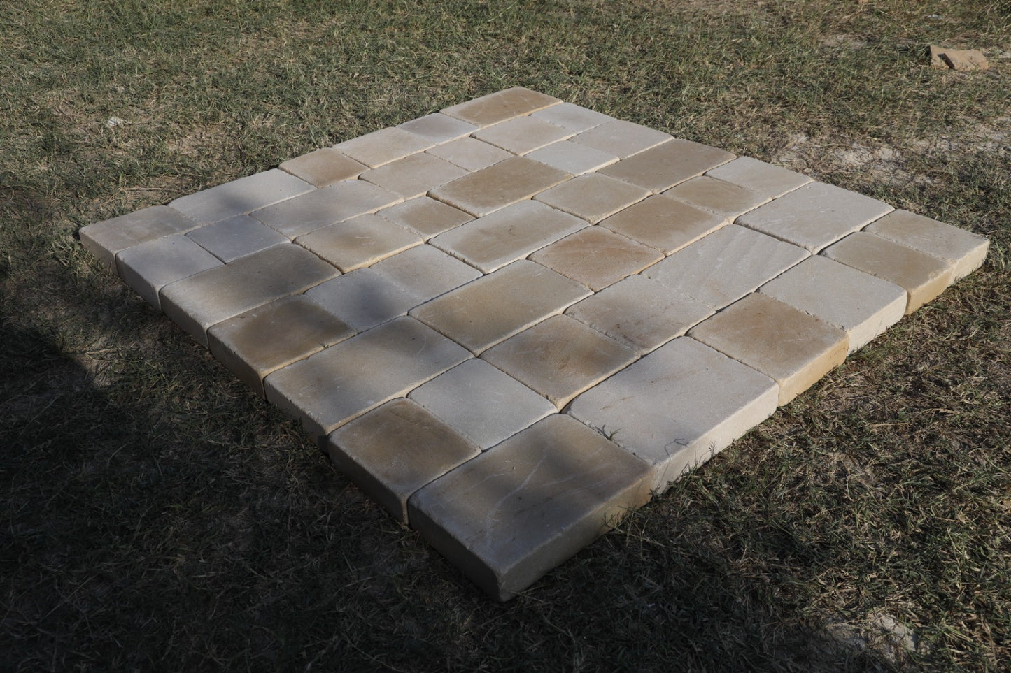 Interlocking block pavings for patios and pathways, durable surface finish.