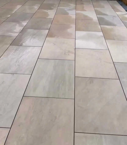 Bristol Green outdoor porcelain paving slabs laid on a modern driveway in the UK