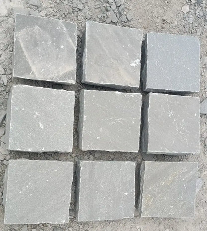 Dry Kandla grey sandstone cobbles and natural stone setts UK