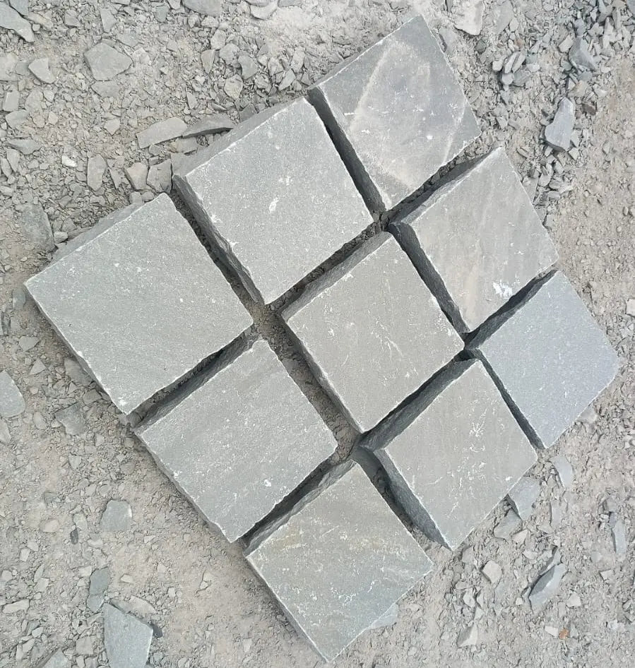 Natural stone cobbles and granite paving setts application UK