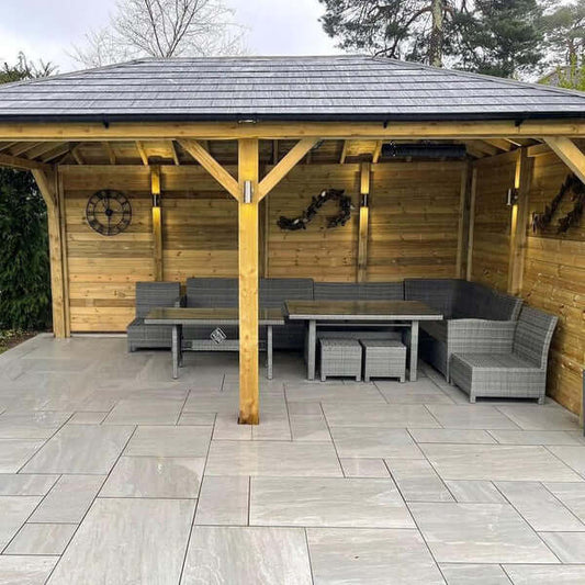 Garden dining area finished with Kandla Grey Patio slabs