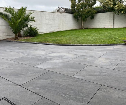 Leeds Ash paving slabs, stylish light grey porcelain for garden and patio design.