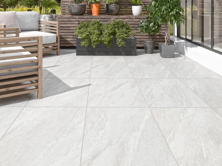 Norfolk White paving, durable porcelain slabs with a clean white tone for minimalist landscaping.