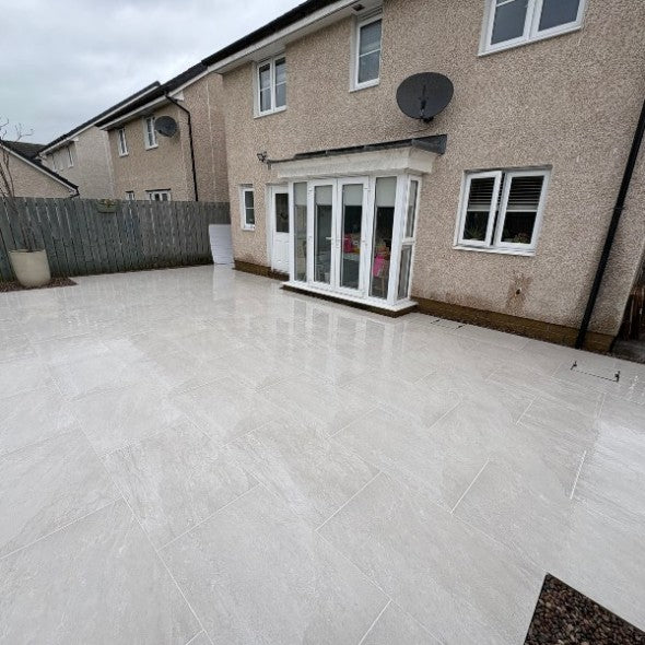 rasa white porcelain paving laid near a garden in the leeds in the UK