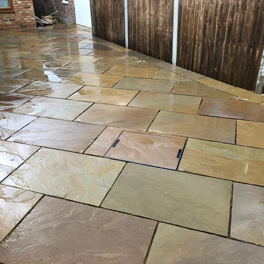 Rippon Indian sandstone paving slabs, warm multi-colored tones for patios.