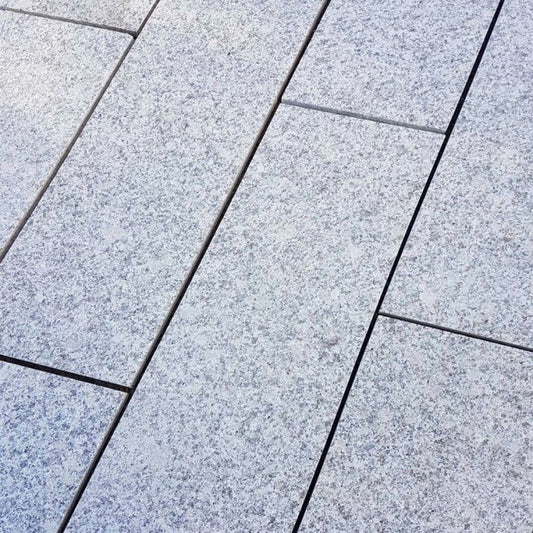 Silver Grey Granite Cobbles for driveways and pathways, split finish, 200x100 paving setts.