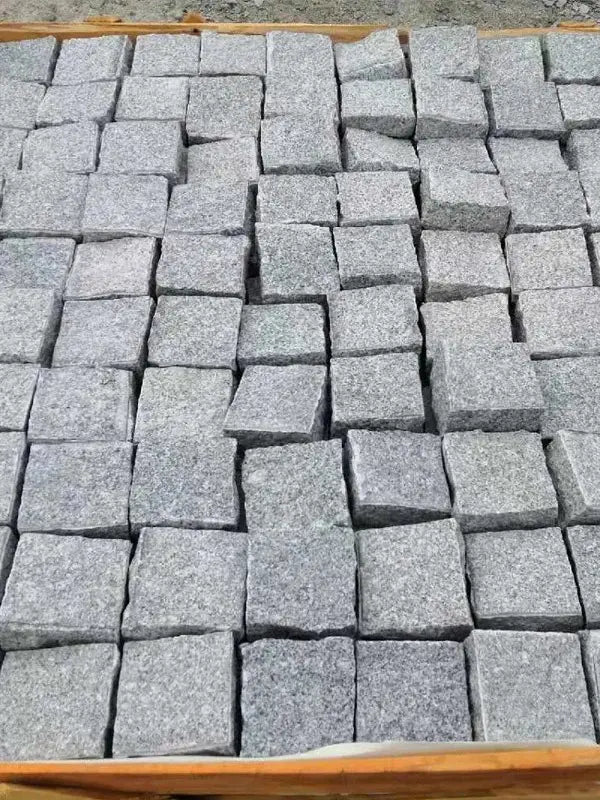 Silver grey granite handcut cobbles and rustic pathway paving UK
