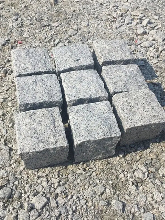 Silver grey granite natural cobbles and traditional cobblestone pavers UK