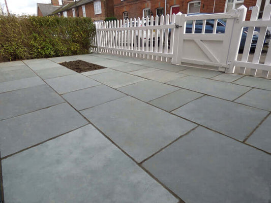 Tandur Grey Limestone laid in a landscaped garden UK