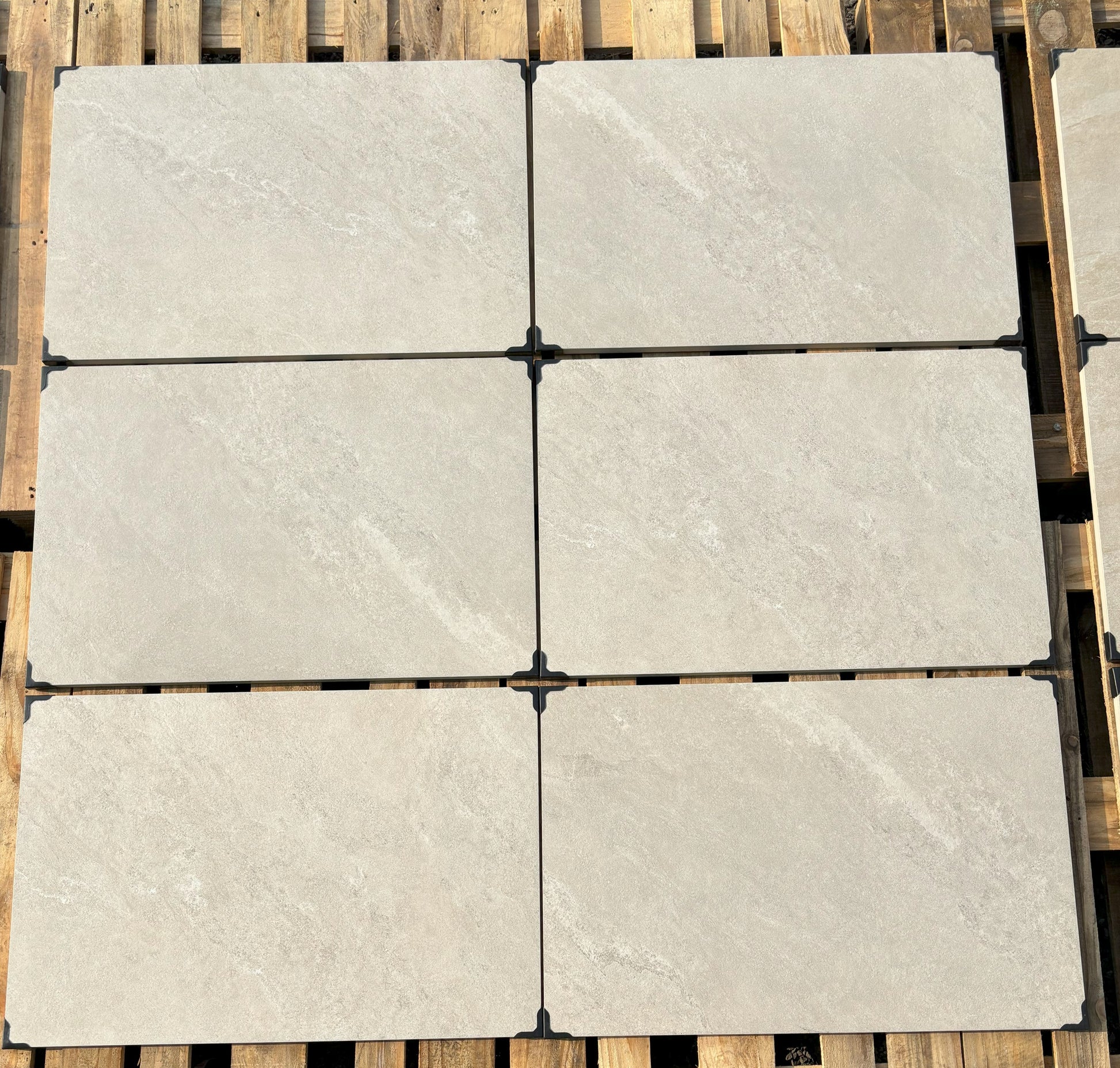 Yorkstone White patio slabs, natural stone effect porcelain for elegant landscaping.